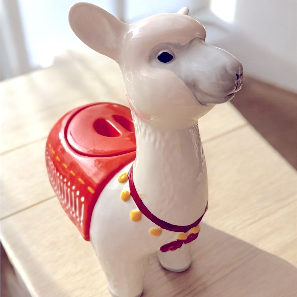 Ceramic Llama cookie jar with Orange Saddle